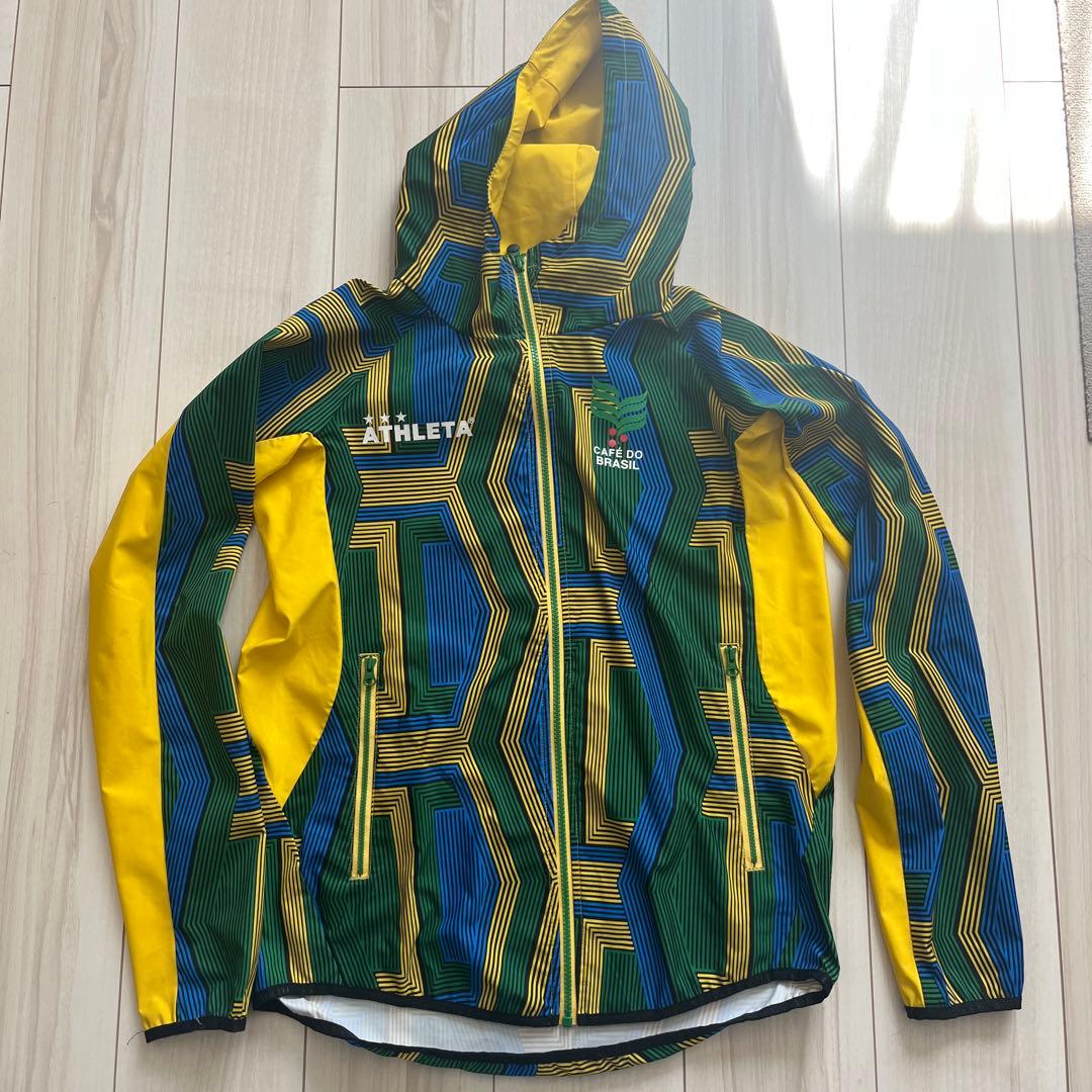 ATHLETA ピステ・ウィンドブレーカー フード付き - メルカリ